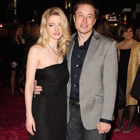 Elon and his wife Talulah attaining a party together.